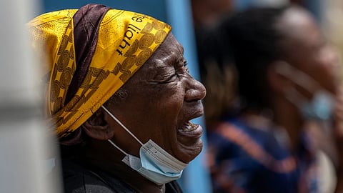 A woman mourns her child, who died of Ebola, at the General Hospital in Bunia, Congo, Thursday, May 21, 2026.