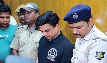 Ashish Reddy, the accused, was found driving a vehicle bearing Tamil Nadu registration number with a beacon on top.