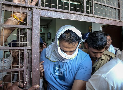Samarth Singh, husband of model-turned-actor Twisha Sharma and an accused in her death allegedly due to dowry harassment, being taken into police custody after his appearance in a court, in Bhopal, Saturday, May 23, 2026. 