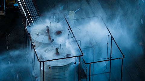 Water is sprayed on a tank that overheated at an aerospace plant in Garden Grove, Calif., Friday, May 22, 2026. 