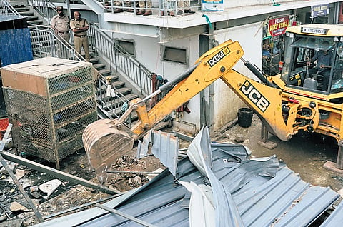 City corporation authorities demolish illegal constructions at  Connemara Market , Palayam in Thiruvananthapuram on Sunday  