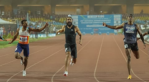 Gurindervir Singh (c) clocked 10.9 seconds in the men's 100m final on Saturday 