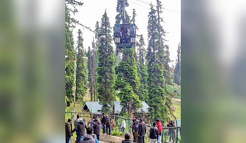 Gulmarg: Tourists remain stranded after the Gulmarg Gondola cable car service was temporarily halted due to a technical fault, in Baramulla district of Jammu and Kashmir on Monday, May 25, 2026. 