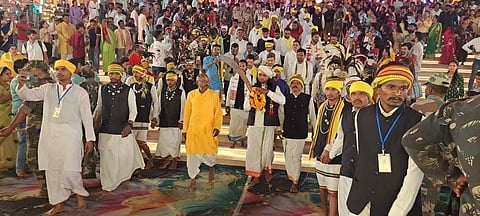 Gond Tribal Kishore Netam at temple premises before the rooster sacrifice.