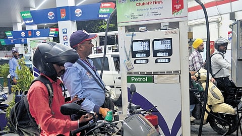 Motorists line up at a fuel station after another fuel price hike.