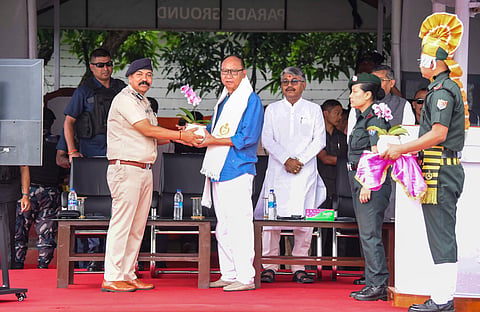 Manipur Chief Minister Yumnam Khemchand Singh receives a memento during the flag-off ceremony of newly inducted Manipur Police vehicles at the 1st Battalion Manipur Rifles Parade Ground, in Imphal, Monday, May 25, 2026. 