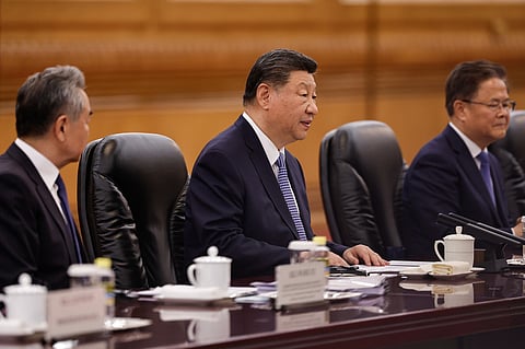 Chinese President Xi Jinping, center, attends a meeting with Pakistan's Prime Minister Shehbaz Sharif at the Great Hall of the People, in Beijing, China, Monday May 25, 2026.