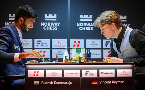 D Gukesh (L) during his clash against Vincent Keymer
