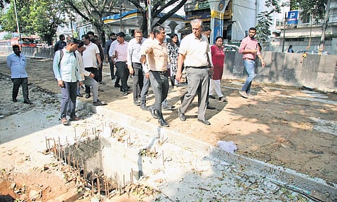 GBA Chief Commissioner Maheshwar Rao inspects pending work on the railway underpass in Okalipuram on Tuesday