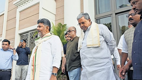  Deputy Chief Minister DK Shivakumar and Chief Minister Siddaramaiah emerge from Indira Bhavan after holding talks with Congress high command leaders, in New Delhi on Tuesday 
