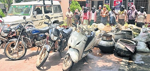 The eight accused along with the seized items at Rengali police station