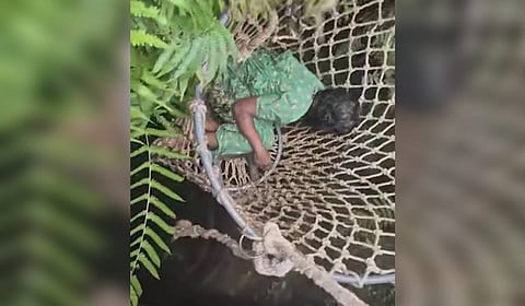  Fire and rescue personnel rescuing the 57-year-old woman who fell into a well at Kolenchery on Tuesday