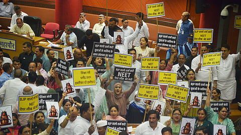 Oppn councillors protest over the NEET paper leak issue on Monday. 