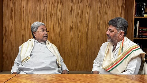 Karnataka Chief Minister Siddaramaiah, left, with Deputy Chief Minister DK Shivakumar at Indira Bhavan ahead of consultations with the Congress leadership.