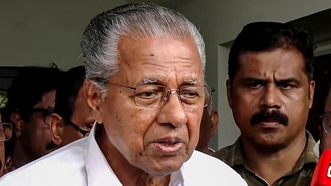 Former Kerala Chief Minister Pinarayi Vijayan speaks to the media after the Enforcement Directorate (ED) conducts a raid at his residence as part of the ED's investigation in the CMRL money laundering case, in Thiruvananthapuram, Wednesday, May 27, 2026.