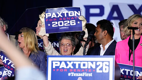 Attendees celebrate after Texas Attorney General Ken Paxton, a Republican candidate for the U.S. Senate, won the Republican party's nomination during a primary runoff election night event Tuesday, May 26, 2026, in Plano, Texas.
