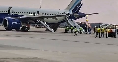 Rescue and evacuation operation underway after smoke was detected in the cabin and cockpit of an IndiGo aircraft, at the Bengaluru airport, Tuesday, May 26, 2026. Two passengers were injured during the evacuation of more than 230 people. 