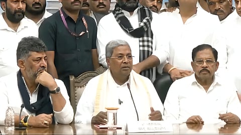 Siddaramiah addressing a press conference after tendering his resignation.