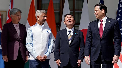 Foreign ministers pose for a group photo during the Quad meeting at Hyderabad House in New Delhi on May 26