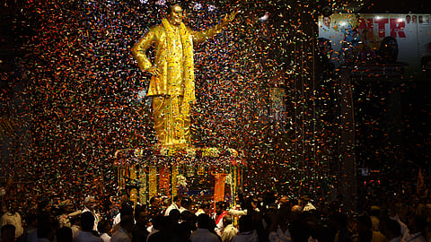 Chief Minister A Revanth Reddy unveils a statue of former chief minister of undivided Andhra Pradesh NT Rama Rao on his 103rd birth anniversary, at Maitrivanam junction in Ameerpet, Hyderabad on Thursday.