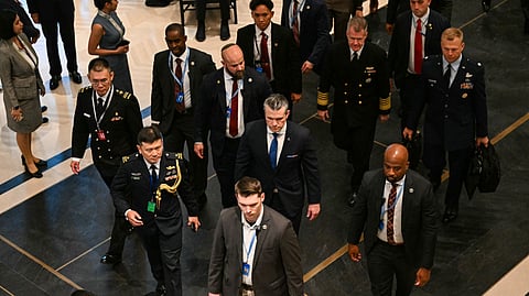 US Secretary of Defense Pete Hegseth (C) arrives for a bilateral meeting with Singapore's Minister for Defence Chan Chun Sing on the sidelines of the Shangri-La Dialogue Summit in Singapore on May 29, 2026.