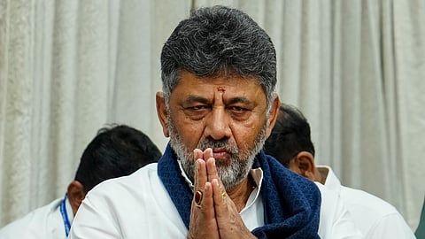 Karnataka Deputy Chief Minister DK Shivakumar greets during a press conference in Bengaluru on Thursday, May 28, 2026.