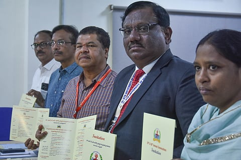 NTR university VC Dr P Chandrashekhar releases the flyer of 29th and 30th convocation during the press conference in Vijayawada on Friday. 