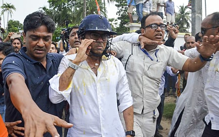 TMC National General Secretary Abhishek Banerjee is attacked by local residents during his visit to meet families affected by post-poll violence in Sonarpur, South 24 Parganas district, on Saturday, May 30, 2026.