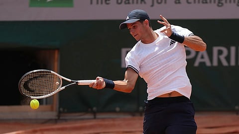Rafael Jodar of Spain returns to Alex Michelsen of the US during their third round men's singles tennis match at the French Open tennis tournament in Paris, Friday, May 29, 2026.
