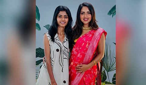 Clare Maria Sebastian with Amala Paul after helping the actor into a sari.