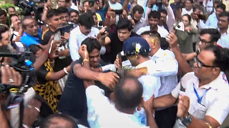TMC General Secretary Abhishek Banerjee wears a helmet after stones, shoes and eggs were hurled at him.