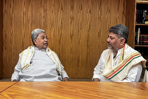 Karnataka Chief Minister Siddaramaiah, left, with Deputy Chief Minister DK Shivakumar at Indira Bhavan 
