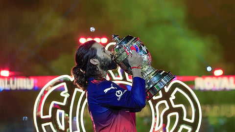 Rajat Patidar celebrates with the trophy