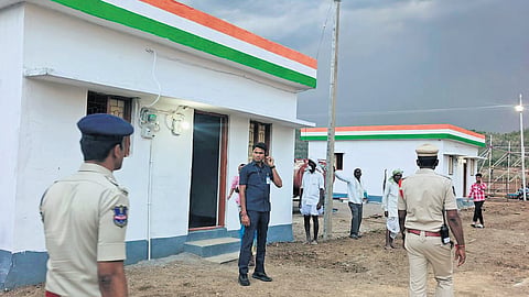 Officials finalise arrangements before the inauguration of Indiramma houses in Kothaguda village, Kerameri mandal, in Komaram Bheem Asifabad district.