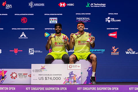 Satwiksairaj Rankireddy (L) & Chirag Shetty celebrate their victory on Sunday
