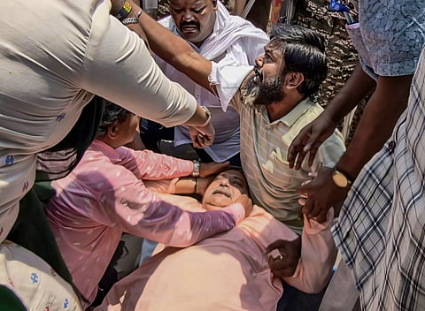  TMC MP Kalyan Banerjee receives assistance after he was allegedly attacked, near Chanditala Police Station in Hooghly, Sunday, May 31, 2026.