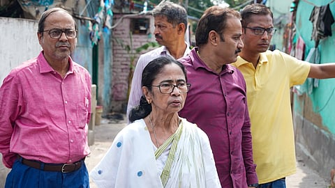 TMC supremo Mamata Banerjee walks towards the residence of party MP Kalyan Banerjee, at Kalighat in Kolkata, Sunday, May 31, 2026.