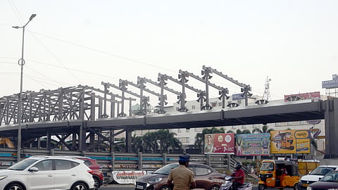 The works of the skywalk underway at Kilambakkam bus terminus