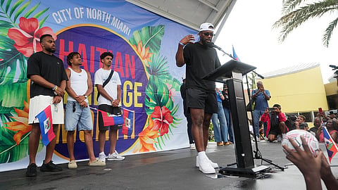 Haiti national soccer team striker Duckens Nazon, right, speaks as his teammates look on at a Haitian Heritage Month event, Saturday, May 30, 2026, in North Miami, Fla., ahead of the FIFA World Cup soccer tournament.