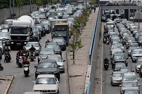Cars sit in traffic on a highway as residents flee following an Israeli threat to strike Dahiyeh, Beirut's southern suburbs, Lebanon, Monday, June 1, 2026.