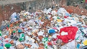 Garbage dumped on railway land near Aluva railway station.