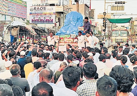YSRCP activists stage protest at the  Srinivasa Circle in Nandyal YSR statue was vandalised on Sunday 