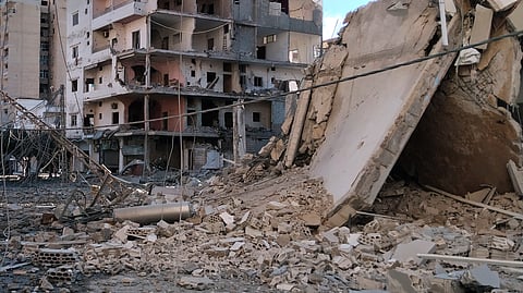 Destroyed buildings hit in Israeli airstrikes are seen in the southern port city of Tyre, Lebanon, Sunday, May 31, 2026.