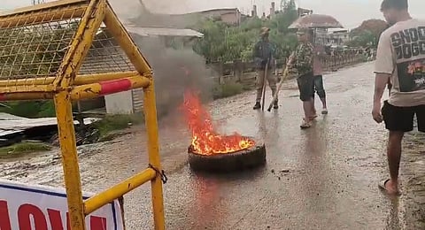 Naga Protesters burned tyres and raised slogans in Manipur.