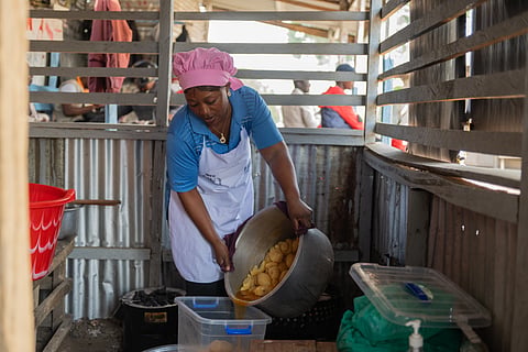 Arlette Basekawike prepares meals for Ebola patients at the Evangelical Medical Center (CEM) in Bunia, Congo, Monday, June 1, 2026. 