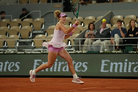 Russia's Mirra Andreeva returns to Romania's Sorana Cirstea during the quarterfinal tennis match at the French Open in Paris, Tuesday, June 2, 2026.