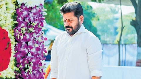 Chief Minister A Revanth Reddy pays floral tributes to Telangana Martyrs at Martyrs Memorial, Gun Park in Hyderabad on the occasion of Telangana Formation Day on Tuesday