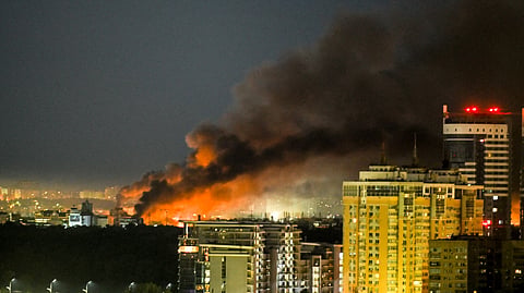 This photograph shows smoke billowing from a fire during drone and missile attacks in Kyiv on June 2, 2026, amid the Russian invasion in Ukraine.