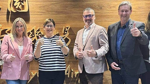 In this image supplied by the Taiwan Ministry of Foreign Affairs (MOFA), New Zealand lawmakers from left, Laura McClure, Maureen Pugh, Duncan Webb and David Wilson gesture as they pose for a photo at Taiwan Taoyuan International Airport, on May 4, 2026
