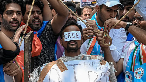 NSUI activists raise slogans during a protest, alleging irregularities in the Central Board of Secondary Education's (CBSE) On-Screen Marking (OSM) evaluation system, outside the board's headquarters at Patparganj, in New Delhi, Saturday, May 30, 2026.